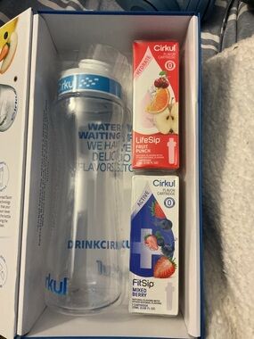 Cirkul Hydration Bottle with Blue Cap and Flavor Cartridges